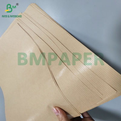 60 gramlık, hediye ambalajı için kayışlı kahverengi kağıt. 70 x 100cm'lik yırtıcı dayanıklı
