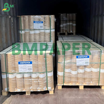 40 gramlık kanatlı kraft kağıdı 26 inç 31 inç arasında Kraft sarı altın kağıt makinesinin bir tarafı camlı.